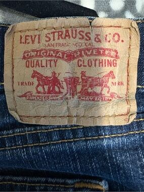 Levi's Women's Dark Blue Bootcut Jeans with Tan Patch